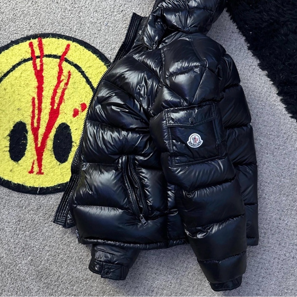Moncler Gray Puffer Jacket with Comic Detail